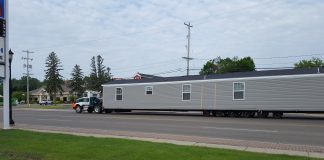 Moving a Mobile Home: Your Questions Answered Photo of mobile home moving