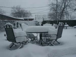 garden furniture in snow