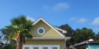 What is a Park Model RV Home? RV next to a park model