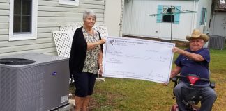 Community Owners Offer Assistance for Veterans in Need Veterans Assistance Fund Crocketts check