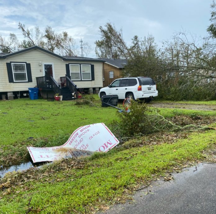 manufactured home endures hurricane laura downed tree