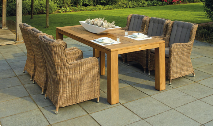 Furniture sitting on a tile mobile home patio