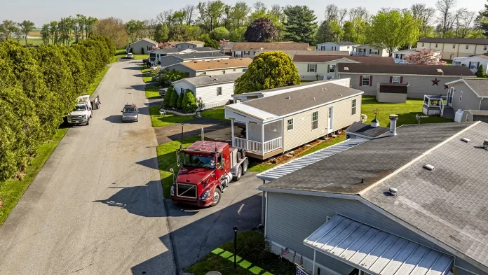 Photo of a mobile home being moved