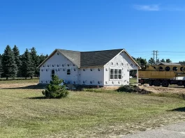 Is It Cheaper to Build or Buy Modular? Photo of a modular home recently installed on a foundation