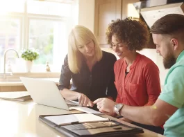 How to Negotiate the Price of a New Mobile Home Photo of people negotiating the price of a home