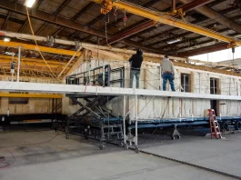 Who Is the Top Mobile Home Manufacturer? Photo of a mobile home being built in a factory