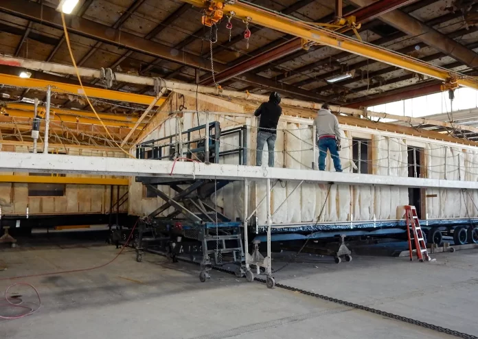 Photo of a mobile home being built in a factory